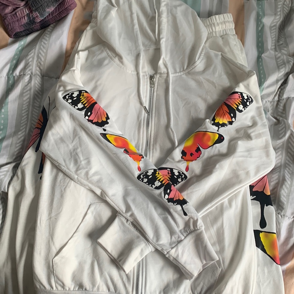 White butterfly track suit